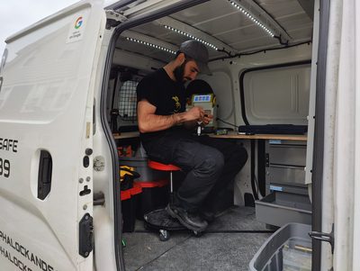 Oren, owner and lead locksmith technician at Alpha Locks and Safe, working on a lock in Westchester County NY